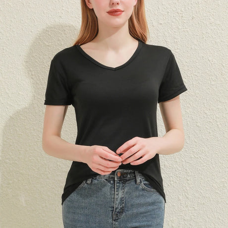 Black slim fit cotton V-neck tee on a woman, perfect for summer with lightweight, breathable fabric.