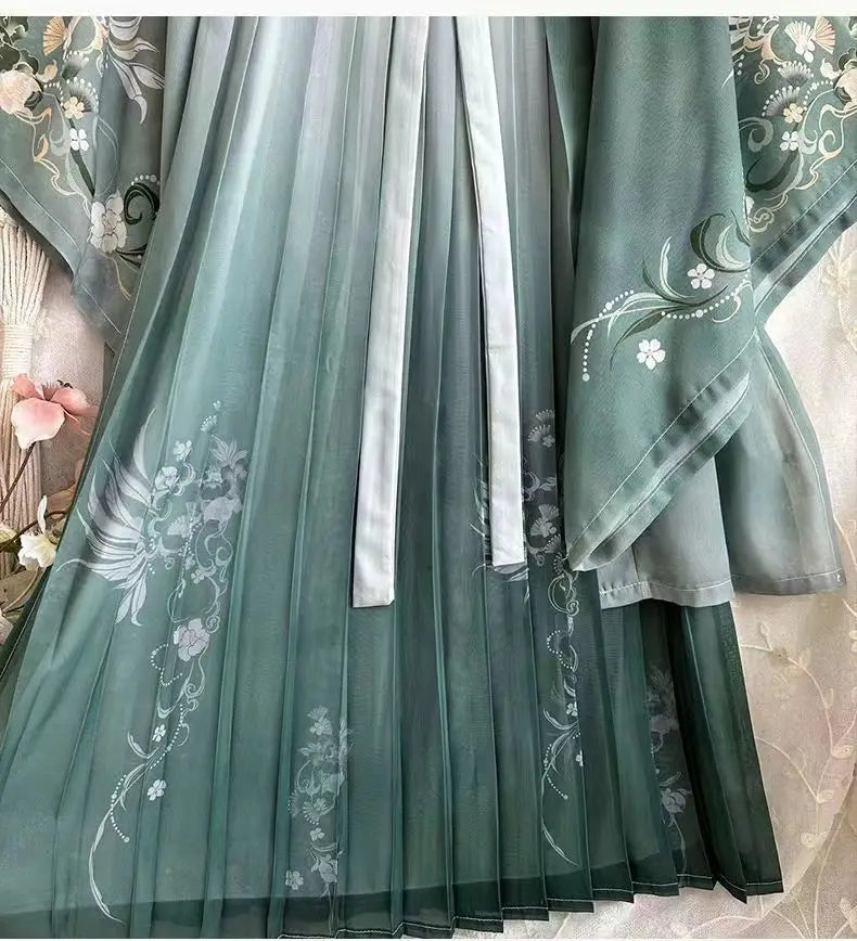 Elegant Song Dynasty Hanfu set featuring chiffon fabric with intricate floral printing in soft green hues.
