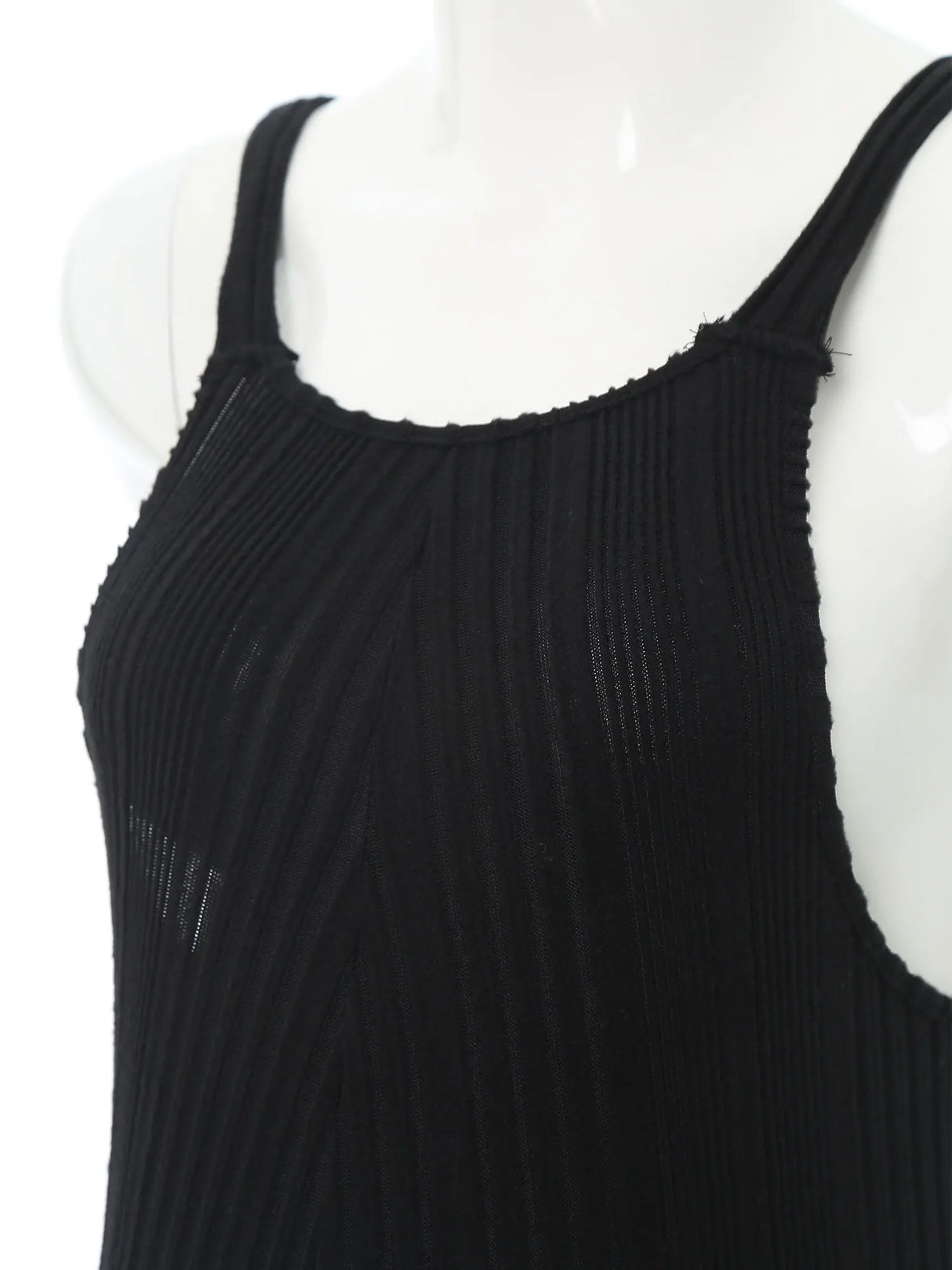 Close-up of the sleeveless ribbed maternity jumpsuit in black, featuring a comfortable loose fit and natural color fabric.