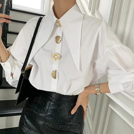 Chic Pearl-Button White Shirt with Bold Collar and Loose Fit, Perfect for Y2K Fashion Style.