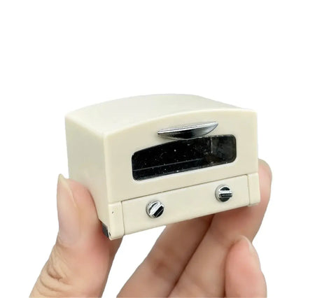 Mini resin oven prop for newborn baby photography, ideal for creative photo sessions, suitable for ages 0-6 months.