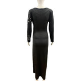 Elegant black ankle-length maternity dress with full sleeves and embellished details, perfect for summer photography.