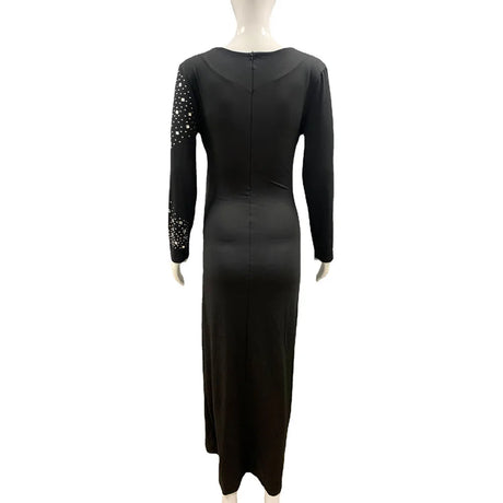 Elegant black ankle-length maternity dress with full sleeves and embellished details, perfect for summer photography.