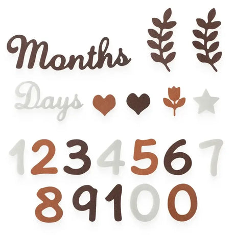 Soft felt baby milestone cards featuring numbers, leaves, hearts, and days for 0-12 months.