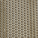 Close-up of sparkling rhinestone embellishments on a glamorous fabric, ideal for party attire and evening wear.