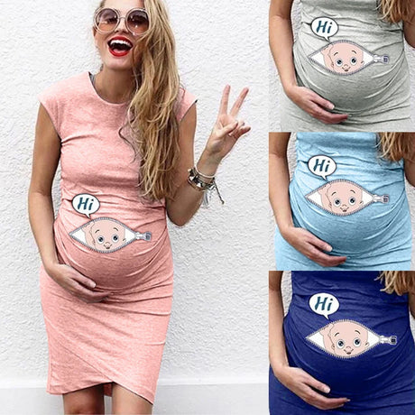 Loose casual maternity dress in soft colors, featuring a playful cartoon design for stylish and comfortable expectant mothers.