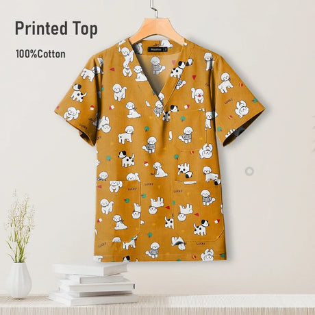 Cute printed V-neck hospital scrub top for women, 100% cotton, featuring fun puppy designs, ideal for pediatric nursing.