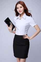 Model showcasing a KoreLux™ white short sleeve shirt styled for a youthful office look with a black skirt.