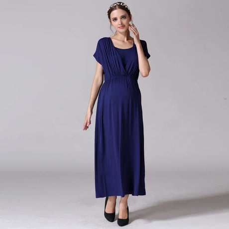 Soft fabric maternity dress in navy blue, designed for nursing and postpartum comfort. Perfect for expectant mothers.