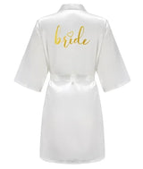 Team Bride gold letter satin robe for women, knee-length silk kimono pajamas, perfect for wedding celebrations.