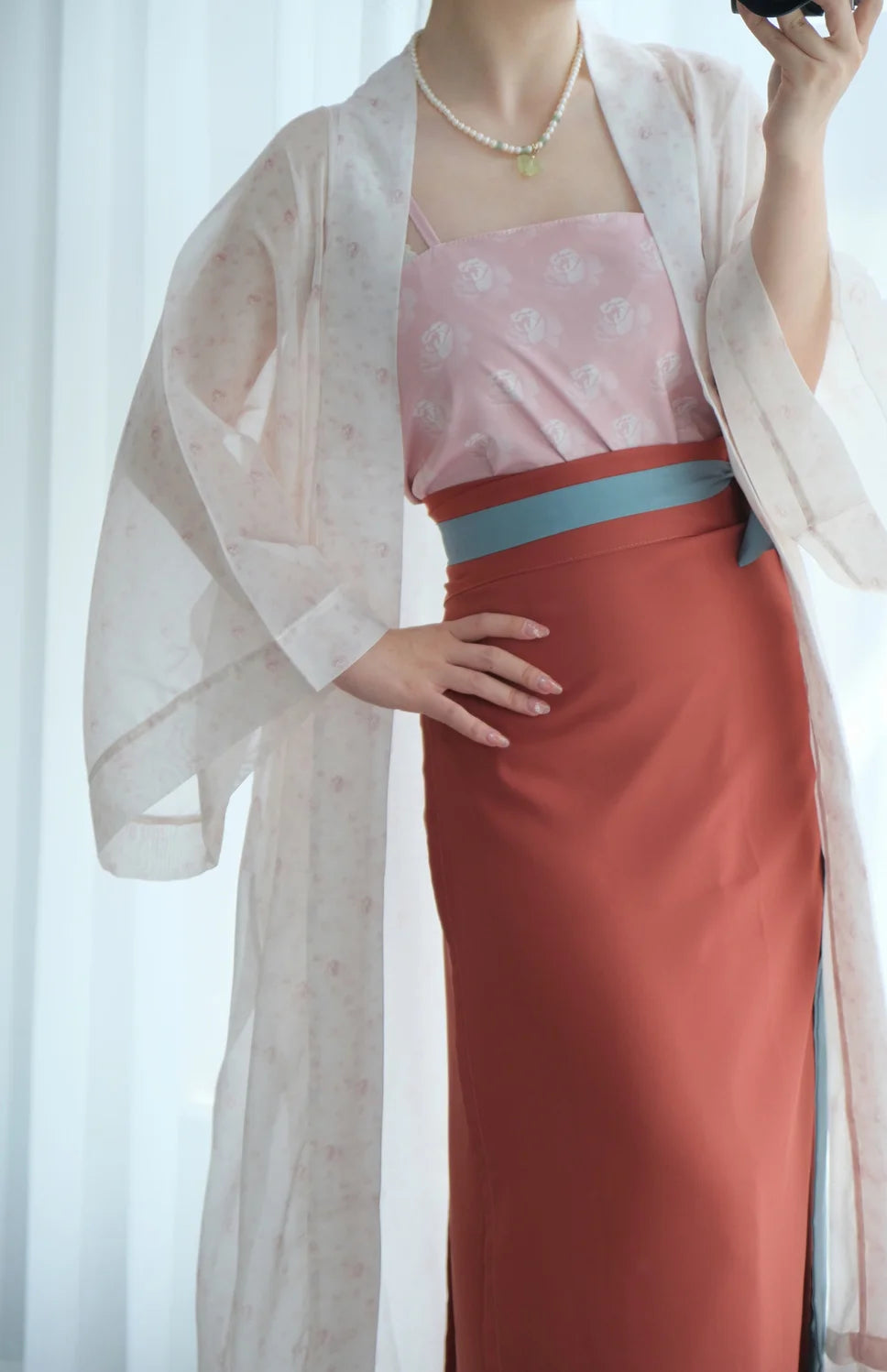 Song Dynasty Hanfu outfit featuring a pink top, rust skirt, and a sheer kimono-style robe, ideal for women.