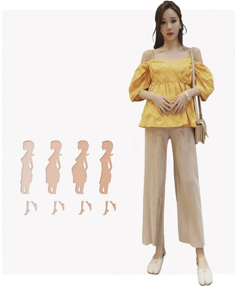 Stylish model in yellow off-shoulder top paired with breathable wide leg maternity pants, showcasing summer fashion for women.