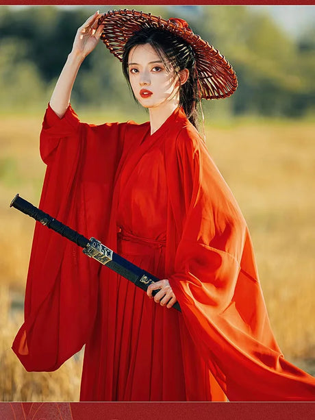 Swordsman Hanfu Costume in wine red, showcasing traditional Tang Dynasty style with a straw hat and sword.