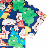 Colorful cartoon print scrub tops for medical use, featuring playful characters on twill fabric, perfect for all genders.