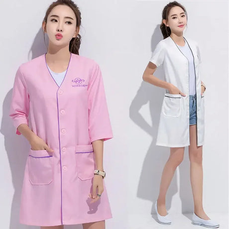 Custom logo spa beauty uniform featuring pink and white short sleeve lab coats for women, ideal for medical and salon use.