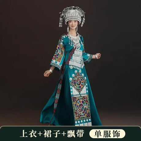 Miao embroidery suit featuring vibrant colors and intricate patterns, perfect for women celebrating festivals.