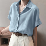 ZanzeaEase™ oversized summer blouse in light blue with button-down design and relaxed fit, perfect for casual wear.