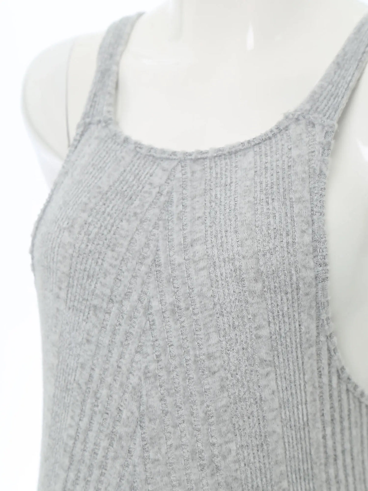 Close-up of a sleeveless ribbed gray maternity jumpsuit made from soft cotton and spandex fabric.
