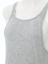 Close-up of a sleeveless ribbed gray maternity jumpsuit made from soft cotton and spandex fabric.