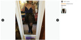 Woman in a stylish velvet bodysuit and skirt, showcasing a chic look in front of a mirror.