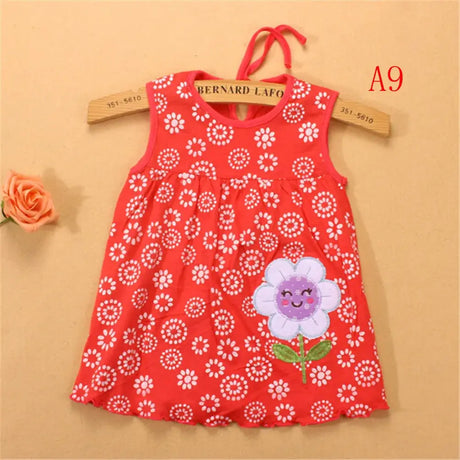 Newborn girls sleeveless cotton dress with floral pattern and cute flower graphic, ideal for summer wear.