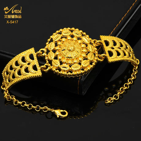 Luxury Indian bridal jewelry bracelet set in 24K gold plating, featuring intricate floral designs, perfect for weddings.