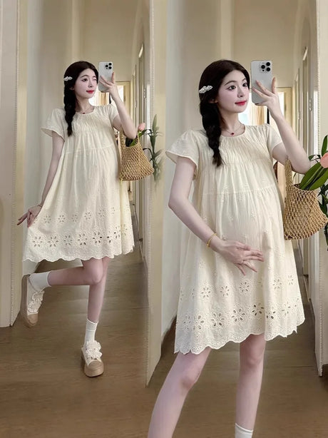 A-line cotton maternity dress in natural color, featuring boat neck and knee-length design, perfect for summer wear.