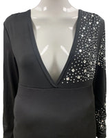 Elegant party maternity dress with v-neck and embellished sleeve, perfect for summer photography.