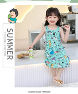 Cute girl wearing a sleeveless, knee-length summer dress with a playful dinosaur print, enjoying a drink.