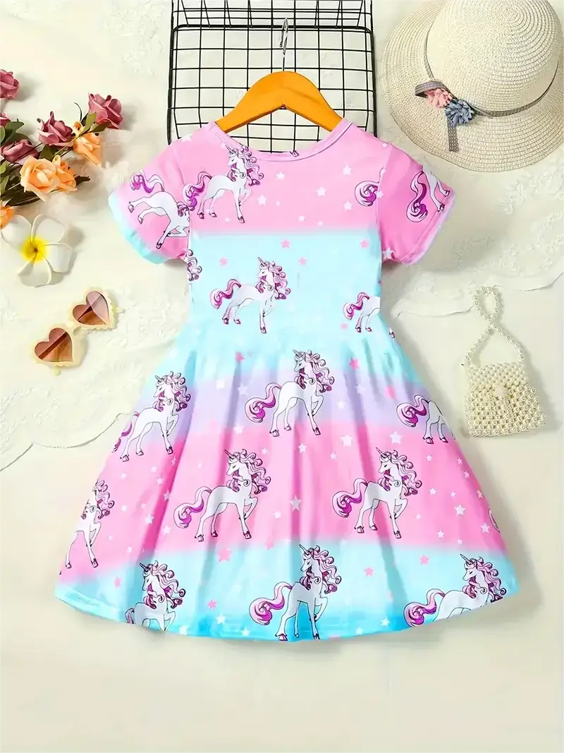 Knee-length unicorn dress for girls, featuring vibrant colors and playful cartoon pattern for summer occasions.