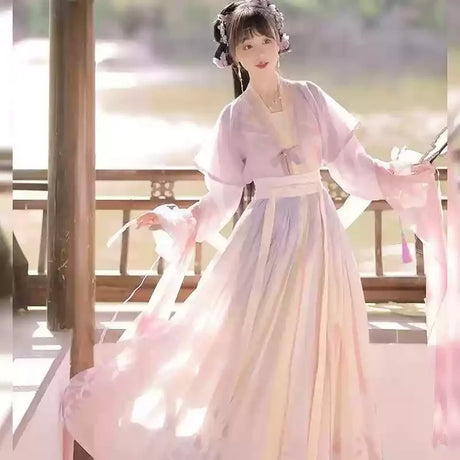 Elegant Hanfu traditional dress for women, featuring soft pastel colors, ideal for party outfits and special occasions.