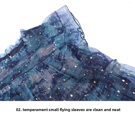 Close-up of LOUIS YAO Sparkling Dress showing neat small flying sleeves and intricate fabric details.