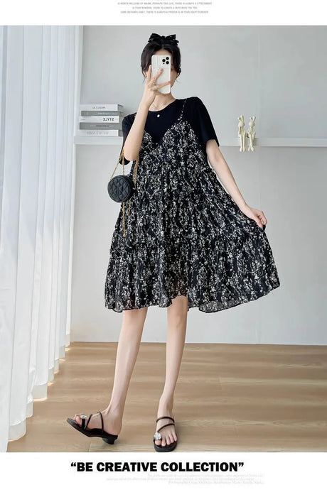 Elegant floral maternity dress in black and white, perfect for summer baby showers and casual outings.