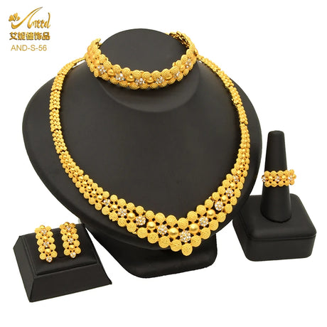 Luxury Indian bridal jewelry necklace set featuring 24K gold plating, includes necklace, earrings, bracelet, and ring.