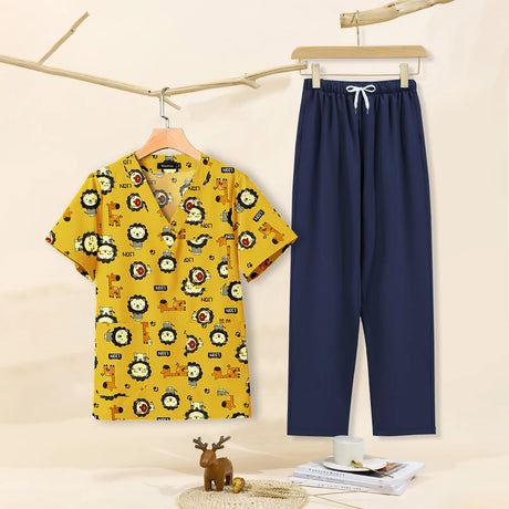 Cartoon print dental scrubs for women, featuring lion design. Includes a V-neck top and navy pants, ideal for pet grooming.
