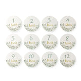 Set of 12 baby milestone cards featuring floral design for monthly photography, ideal for newborns.