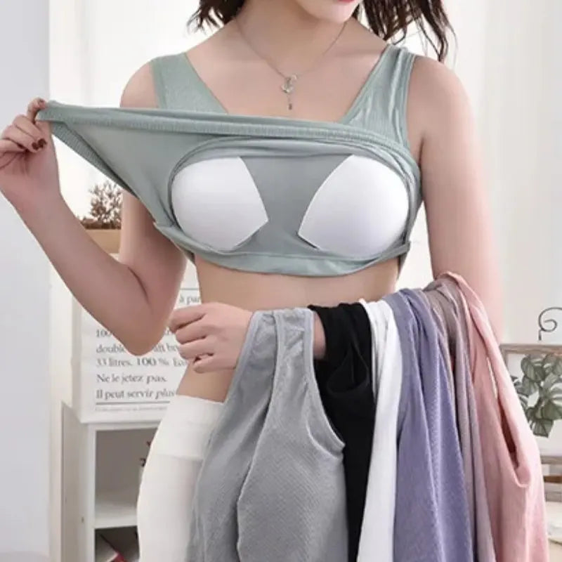 Woman showcasing the KnitMuse™ sexy knitted padded camis in green, holding various colored options.