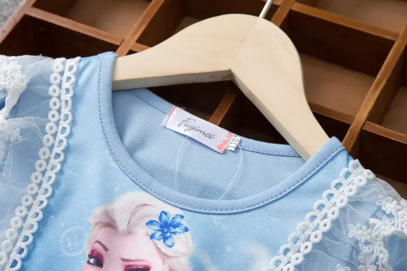 Close-up of the neckline of a girls summer dress featuring a cartoon character, suitable for ages 4-6 years.