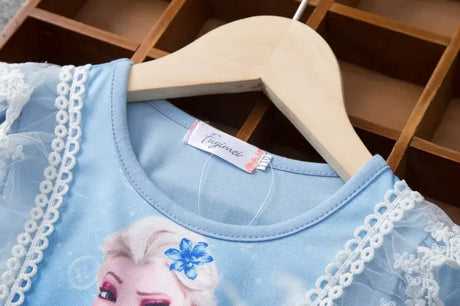 Close-up of the neckline of a girls summer dress featuring a cartoon character, suitable for ages 4-6 years.