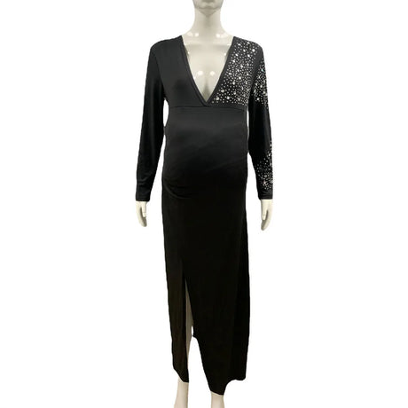 Elegant black summer maternity dress with V-neck and full sleeves, perfect for stylish party photography.