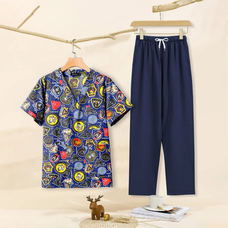 Cartoon print dental scrubs featuring colorful patterns, includes matching navy pants, ideal for pet grooming workwear.