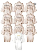 Set of satin bridal robes, featuring 'Bridesmaid' and 'Bride' text, perfect for wedding preparations.