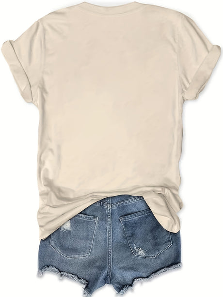 Casual crew neck beige t-shirt paired with denim shorts, perfect for summer outings and music festivals.