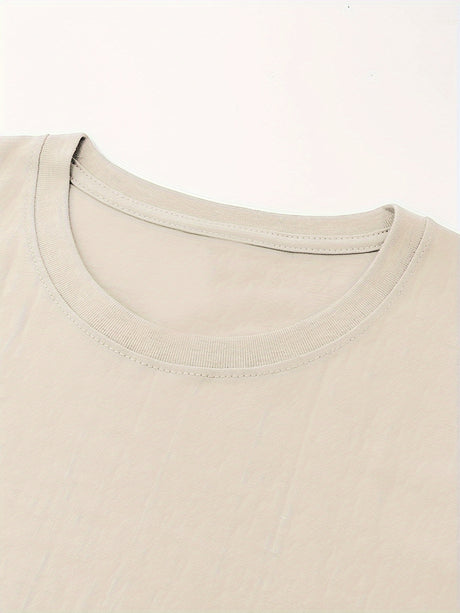 Close-up of a beige crew neck on a retro country music festival t-shirt made from 100% cotton.
